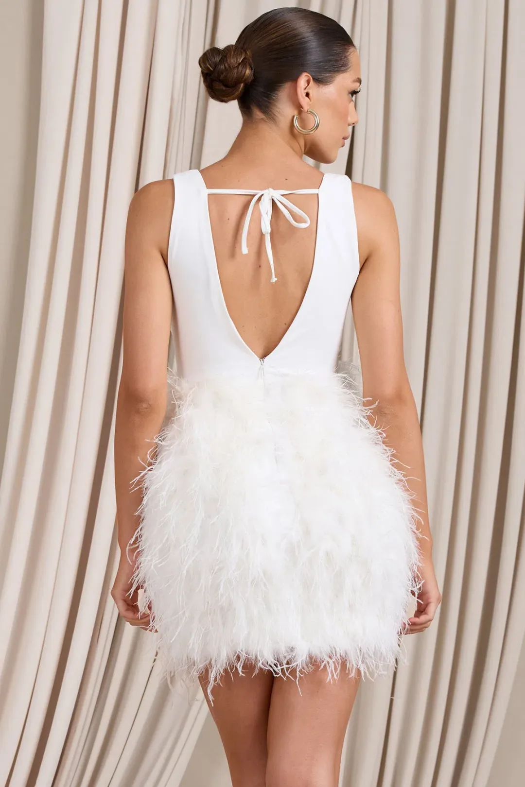 Club L London Flirt  Plunge Front Mini Dress with Feather Skirt White Size 4  for rent on The Volte - main image