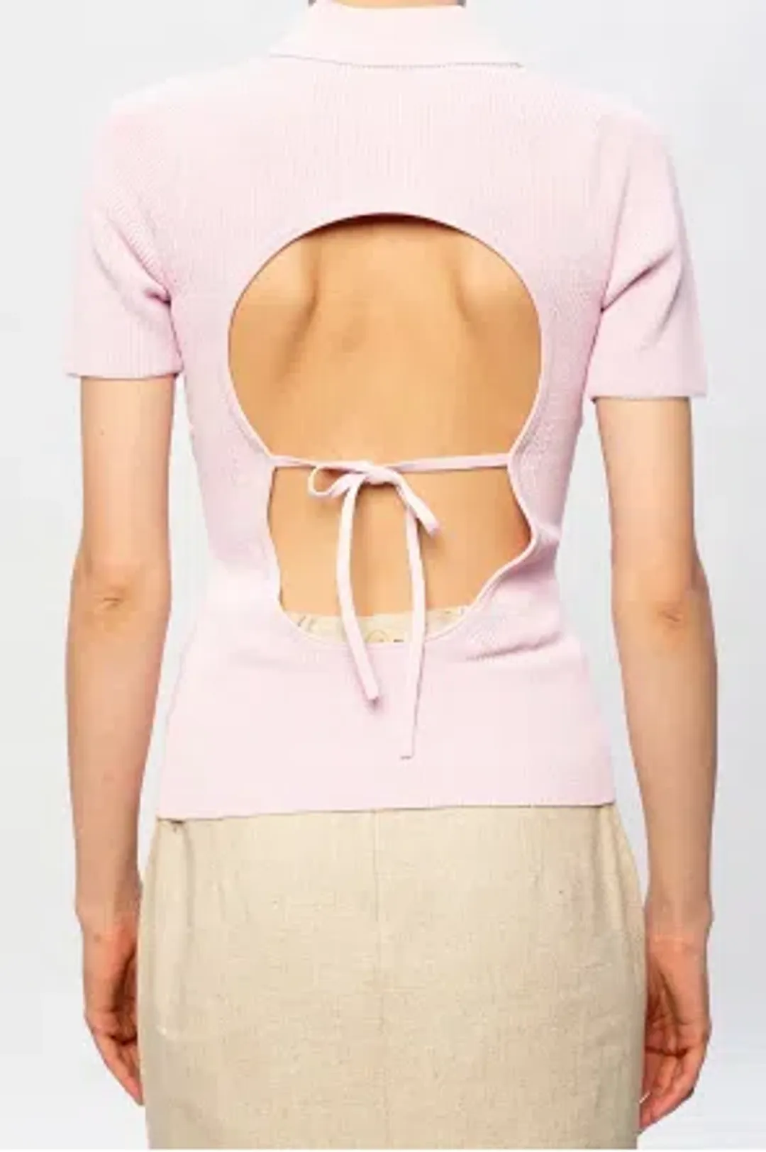 Jacquemus Ribbed Polo Top With Open Back Pink Size 32 / AU 4 for rent on The Volte - main image