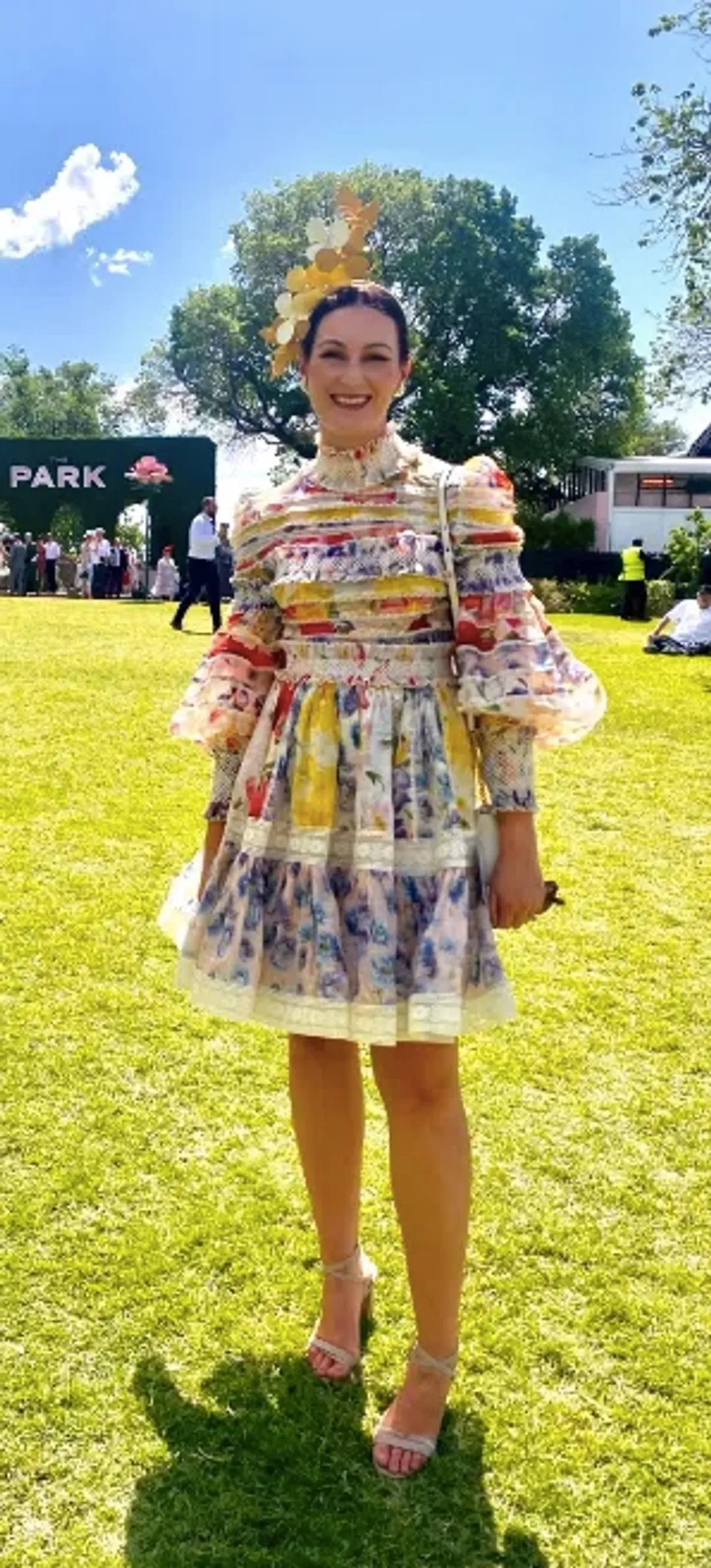 Zimmermann The Wonderland Smocked Mini Dress in Spliced Multi Floral Size 2 / AU 12 for rent on The Volte - main image