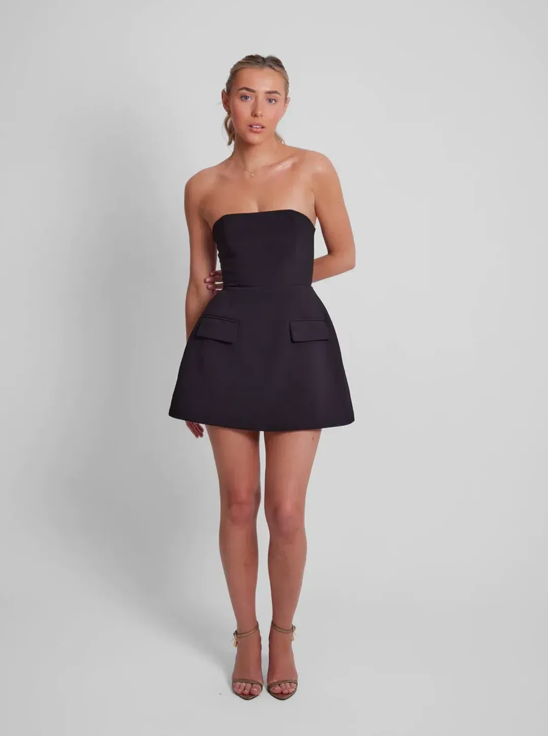 Odd Muse The Ultimate Muse Strapless Mini Dress in Black Size S / AU 8 for rent on The Volte - main image