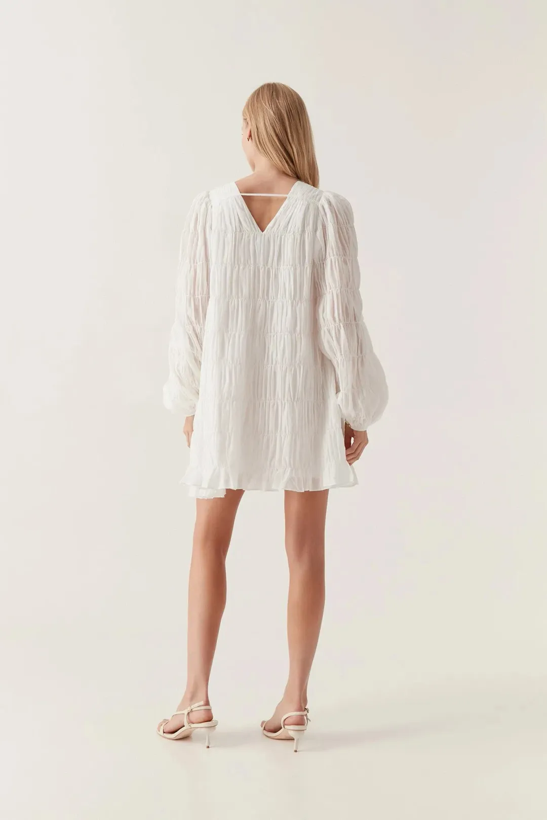 Aje Evelina Ruched Mini Dress in Ivory Size 8 for rent on The Volte - main image