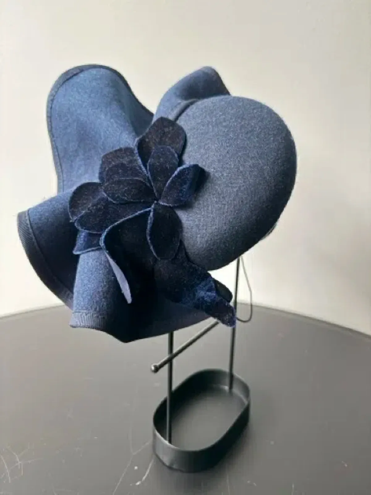 Felted Wool Headpiece with Sculptural Detail and Floral Velvet Adornment Navy One Size - Image 1