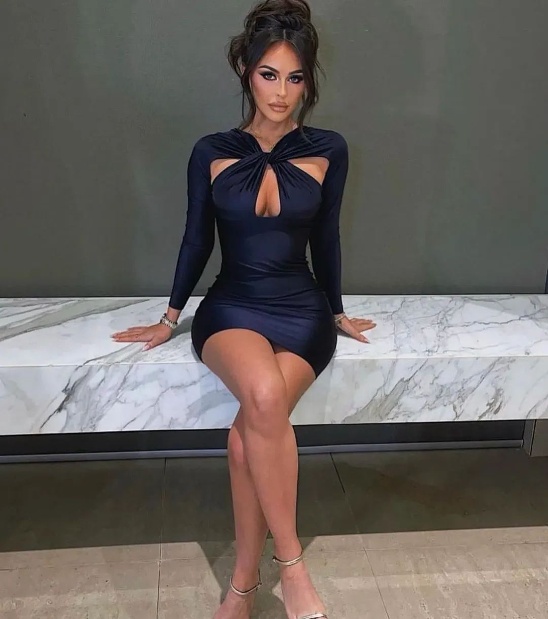 Coperni Jersey Cutout Twisted Mini Dress Black Size 6 for rent on The Volte - main image