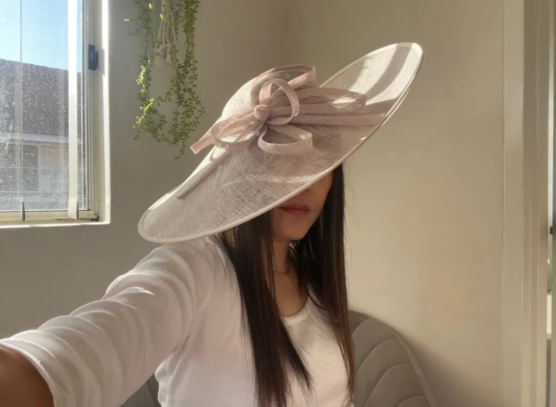 Morgan and Taylor Fascinator Pink for rent on The Volte - main image