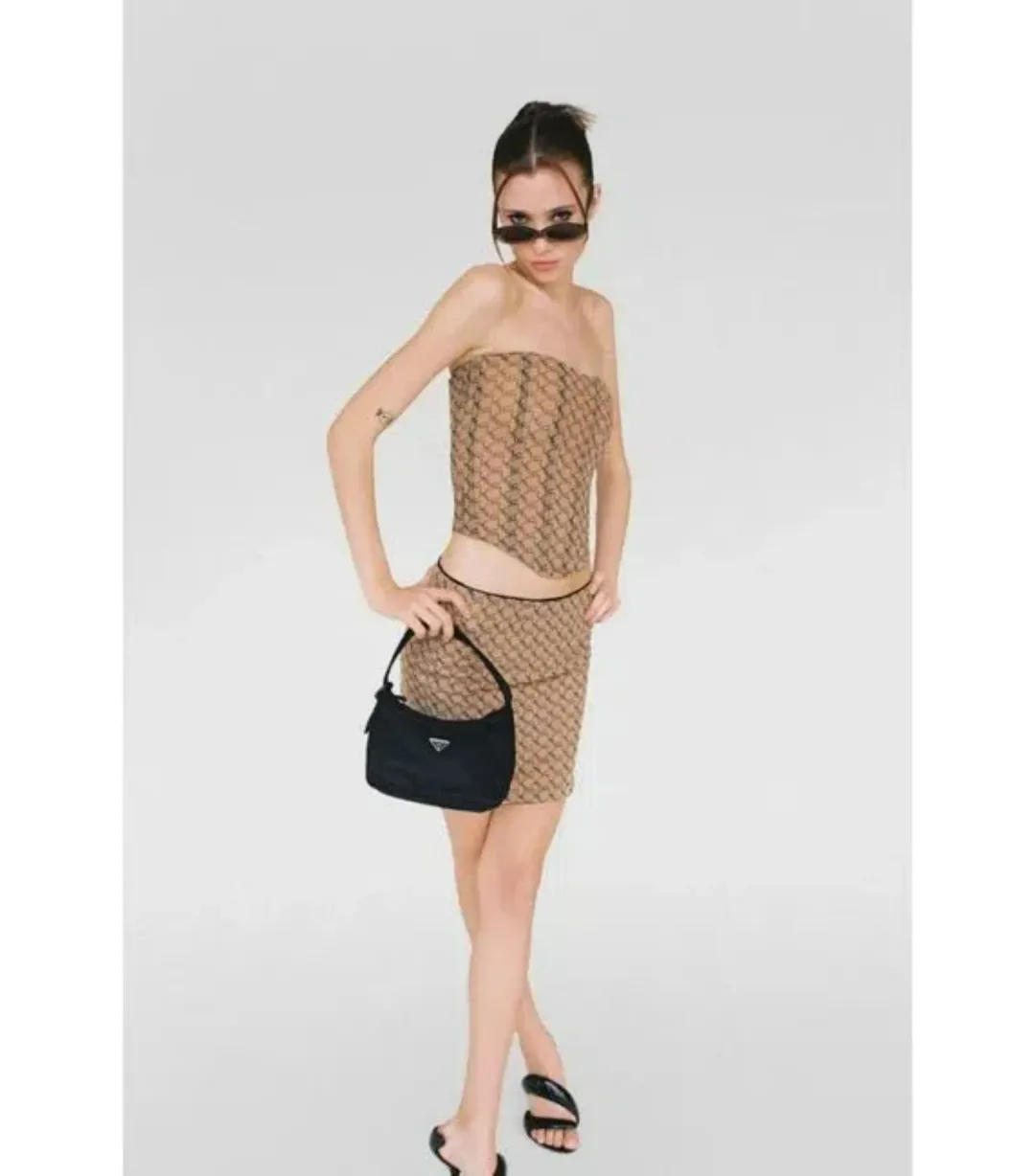 Miaou Peri Corset and Mini Moni Skirt in Nude Monogram Set Size XS / AU 6 for rent on The Volte - main image