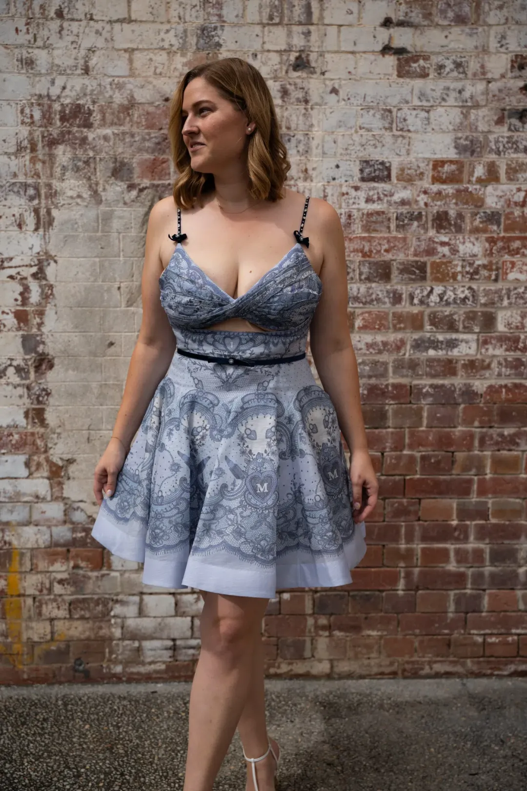 Zimmermann Crush Twist Front Mini Dress Print Size 4 / Aus 16 for rent on The Volte - main image