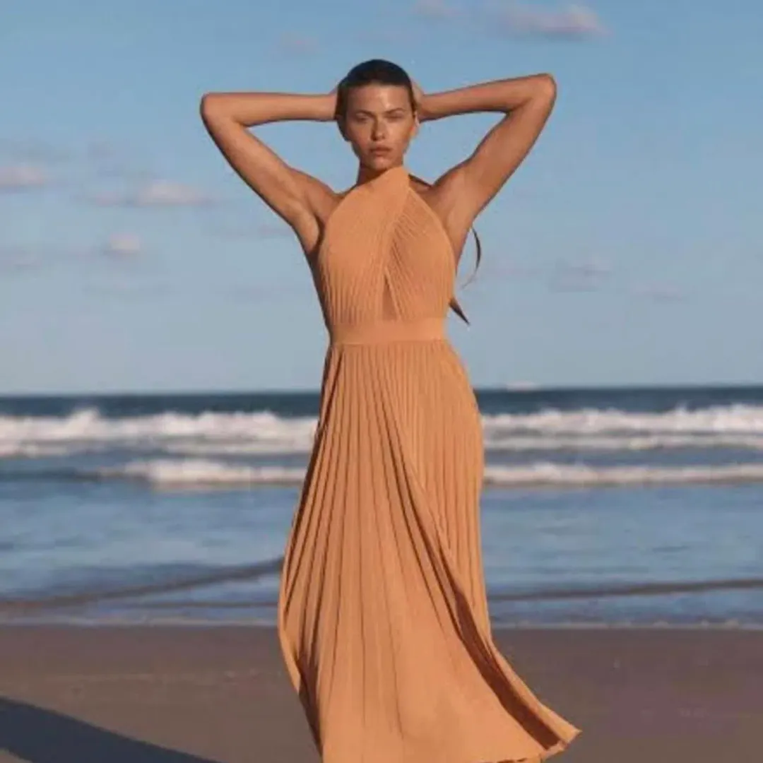 Scanlan Theodore Orange Crepe Knit Pleated Dress Size 10 for rent on The Volte - main image