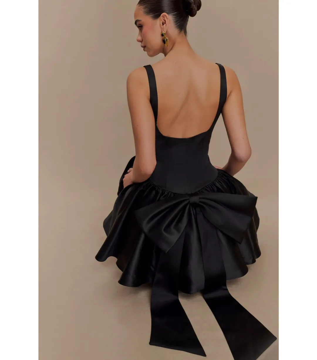 Meshki Felicia Satin Mini Dress With Bow in Black Size 8/S for rent on The Volte - main image