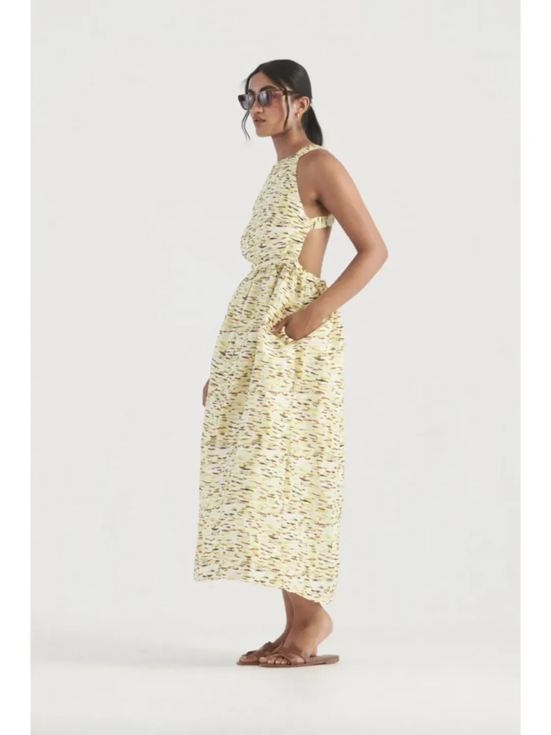 Elka Collective Mari Sleeveless Midi Dress in Citrus Print. Size 8 for rent on The Volte - main image