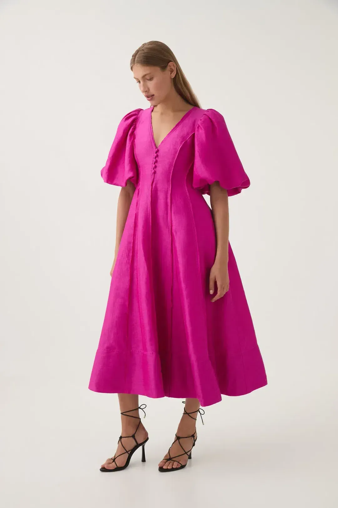 AJE DUSK PUFF SLEEVE MIDI DRESS IN DEEP MAGENTA for rent on The Volte - main image