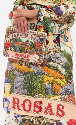 Camilla Blouson Sleeve Bias Dress Aromatic Amor size S (can fit 6-10) and matching clutch for rent on The Volte - image 9