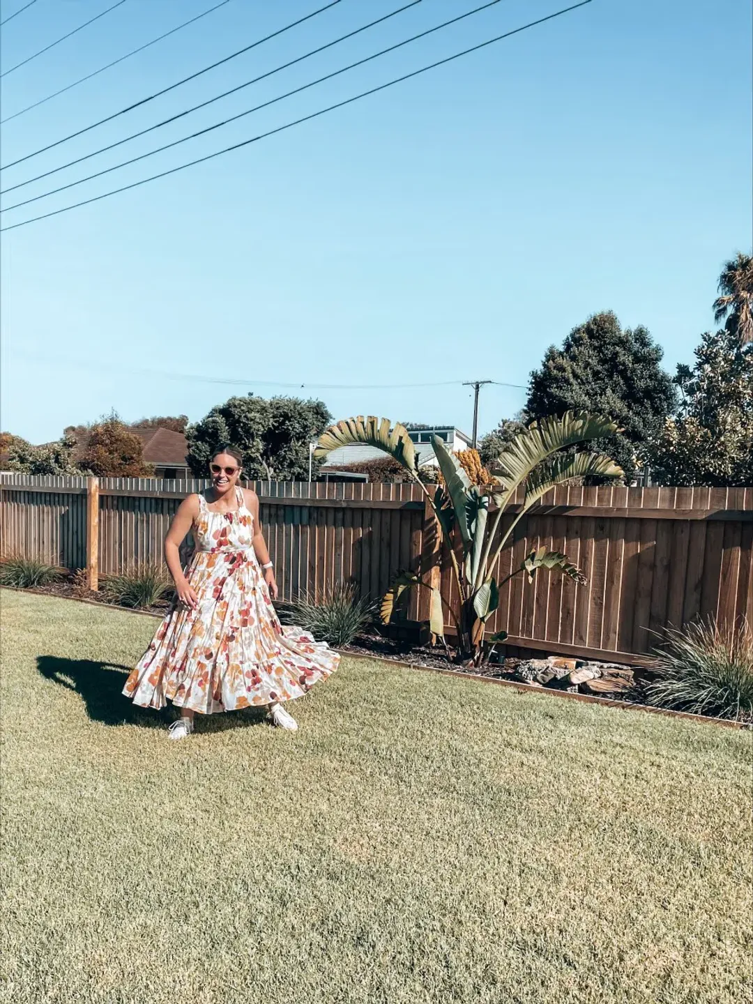 AJE Dassia Tiered Bow Back Maxi Dress for rent on The Volte - main image