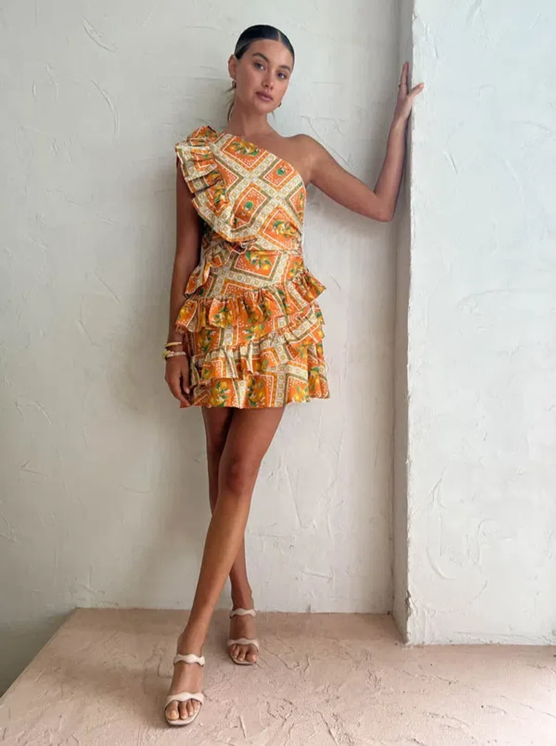 By Nicola Adrift Frill Mini Dress in Orange Mosaic Print Size 10 for rent on The Volte - main image