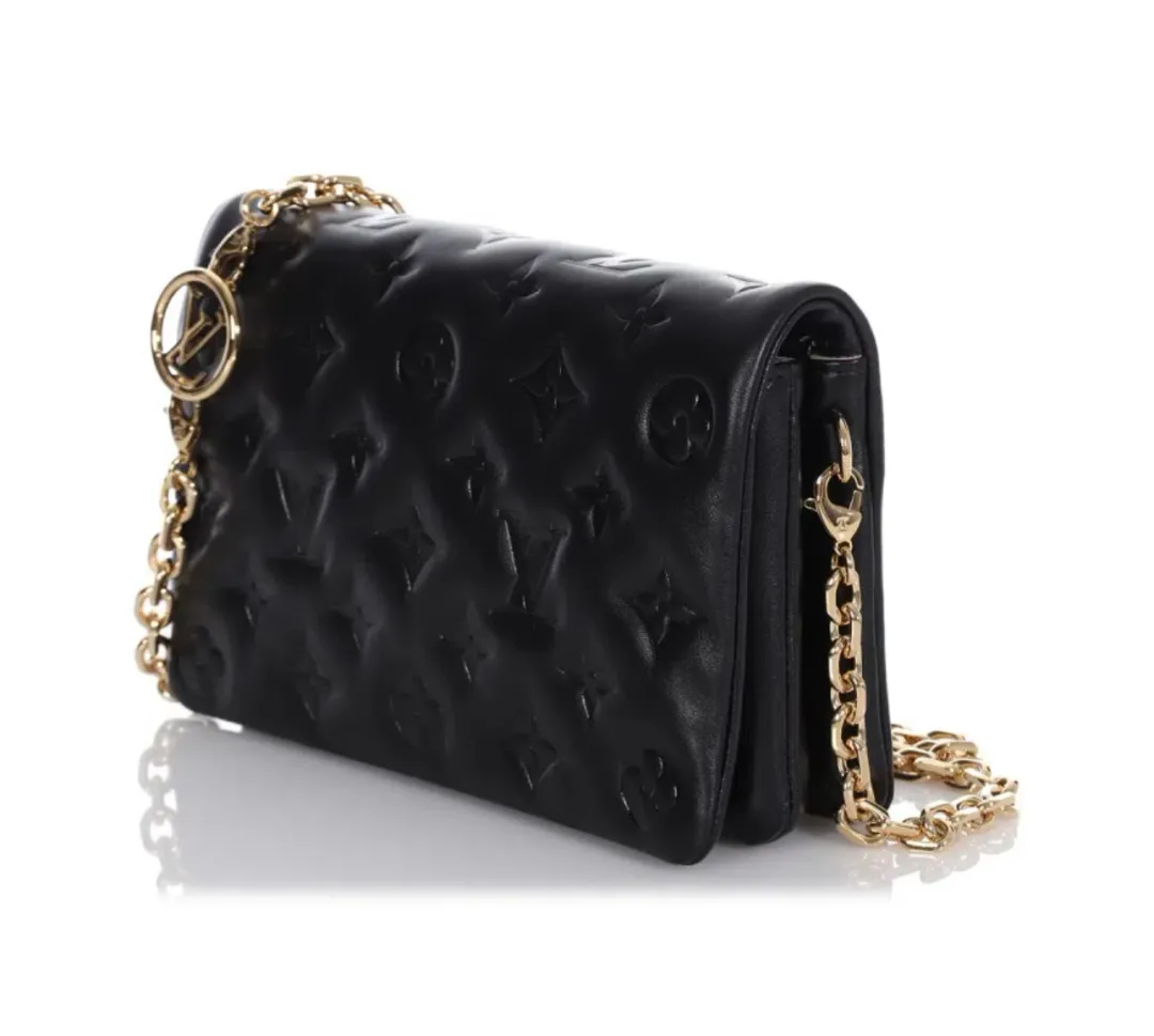 Louis Vuitton Monogram Embossed Puffy Lambskin Pochette Coussin Black with Gold Hardware for rent on The Volte - main image